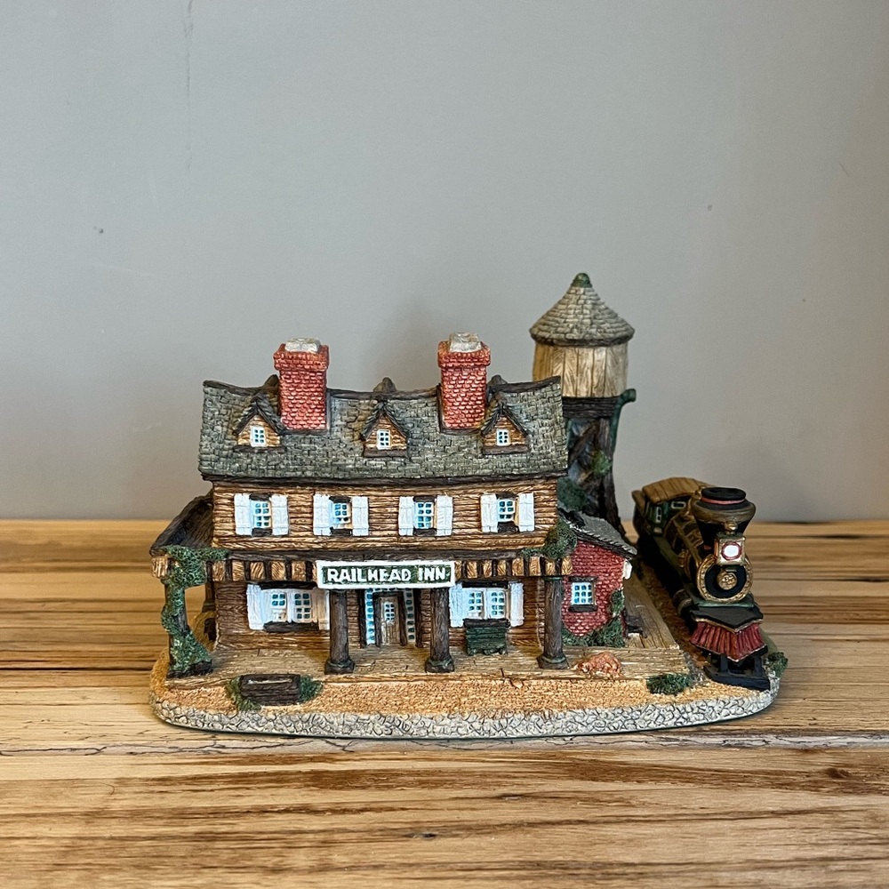 Vintage Railhead Inn by Maurice Wideman statue